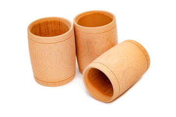  Natural bamboo drinking cup, handmade look, simple and clean white backdrop.