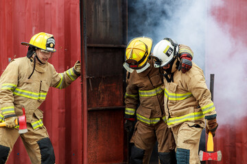 Firefighters assisting injured colleague during emergency rescue