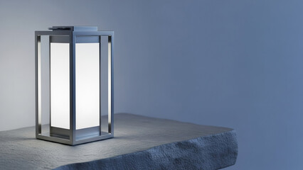 Modern silver Ramadan lantern on gray stone with large copy space