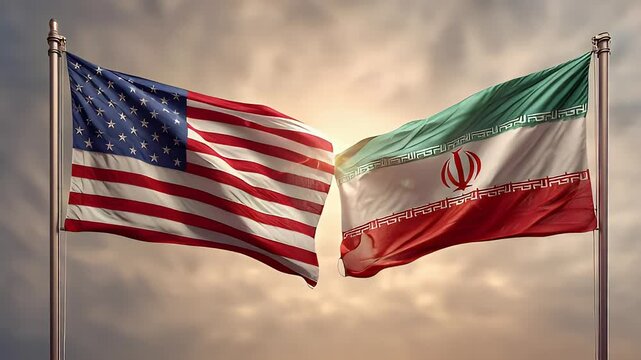 The flags of Iran and the United States wave side by side