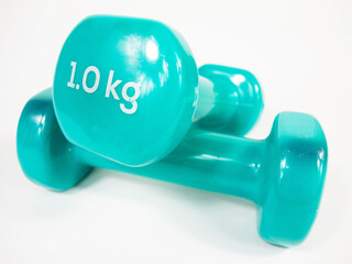 1 kilogram dumbbells on white