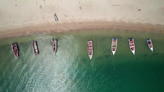Top Down Aerial View of Traditional Pe&ntilde;eros Fishing Boats on Beach