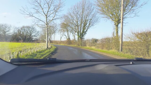 Left side drving on a UK Country Road.