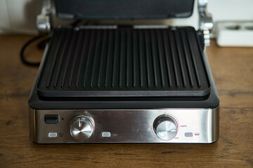 This electric grill has a nonstick surface and adjustable temperature controls for your convenience
