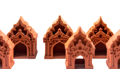 Row of ornate miniature terracotta structures against a black background
