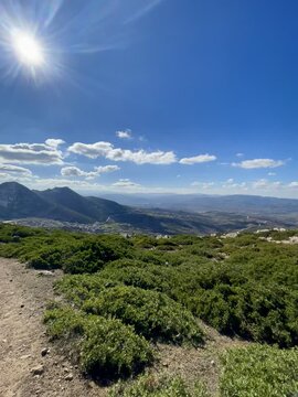 Tetouan, Morocco Scenic forest road near Fahs El Maher Mountain, surrounded by mountains and a calm natural atmosphere