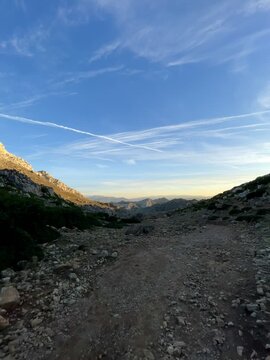 Tetouan, Morocco Scenic forest road near Fahs El Maher Mountain, surrounded by mountains and a calm natural atmosphere