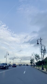Tangier, Morocco Scenic view of a quiet, clear-weather road in the Merqala area of Tangier.