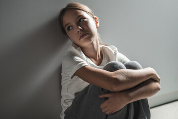 Lonely child tilting head back looks offended expressing sorrow