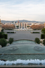 Montjuic fountain cascade leading to barcelona cityscape view