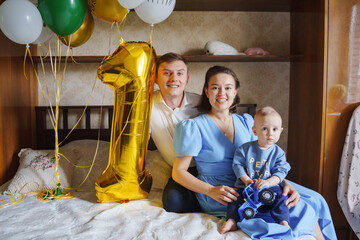 First birthday celebration with balloons and joy