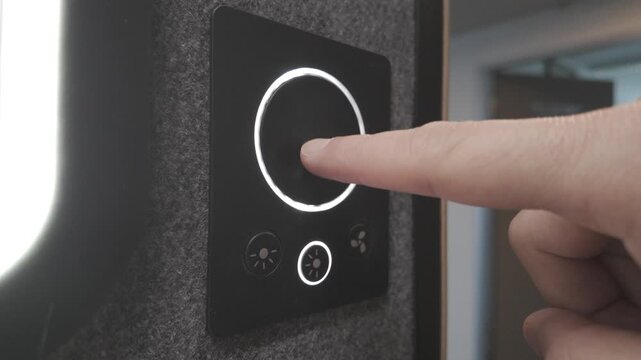 Left side view of user operating smart lighting device