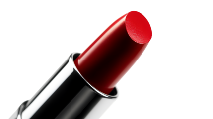 A red lipstick standing upright in its sleek silver case against a black background