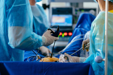 Active phase of gynecological laparoscopic surgery with surgeons manipulating instruments