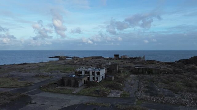 Haunting Octel chemical facility aerial view over abandoned industrial factory offices and wasteland