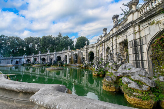 The Fountain of Aeolus in the Royal Park of Caserta with baroque sculptures and arches, Italy