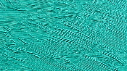 Fototapeta premium Turquoise textured surface with ridges and creases