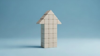 Wooden blocks stacked in upward arrow shape on blue background