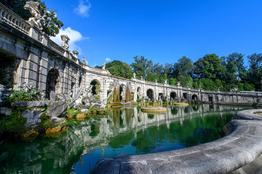 The Fountain of Aeolus in the Royal Park of Caserta with baroque sculptures and arches, Italy