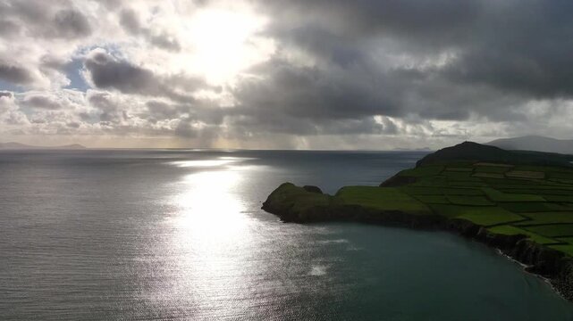 Drone rising reveal dramatic coastline of Dingle Kerry Ireland late afternoon in Ireland