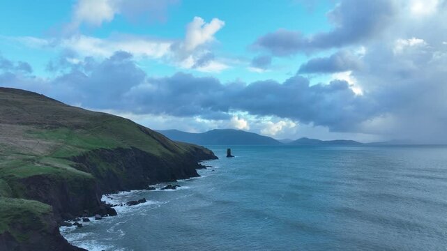 Aerial Ireland wild rugged coast of Dingle Kerry with Kenmare Bay and mountains of the Ring Of Kerry