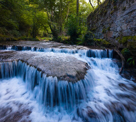 Landscape along a river near San Pedro del Romeral. Pas-Miera region. Pasiegos Valleys. Cantabria. Spain. Europe