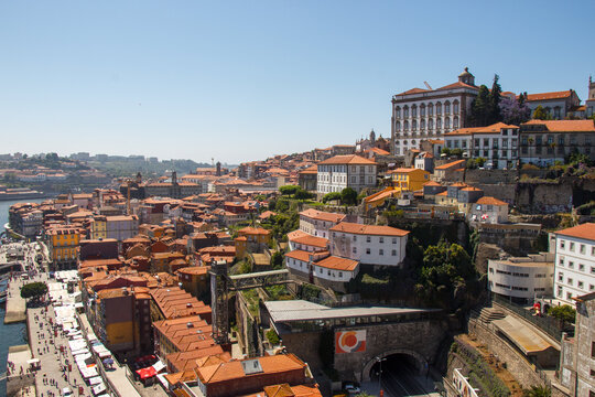 Palacio Episcopal do Porto palace, Cais da Ribeira shore of Dour River and the typical historical portuguese style buildings city of Porto, Portugal