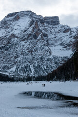 Lake Braies is an alpine lake located in Val di Braies, a side valley of Val Pusteria in winter.