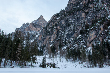 Lake Braies is an alpine lake located in Val di Braies, a side valley of Val Pusteria in winter.