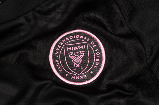 Kyiv, Ukraine. January 13, 2026. Close-up of Inter Miami CF crest embroidered in pink on black football jersey fabric, showcasing club identity and modern sports design.