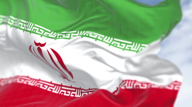 Islamic Republic of Iran national flag waving on a clear day