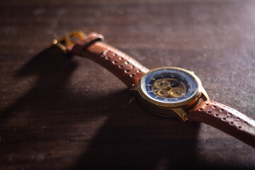Stopped clock on an old table symbolizing lost time, emotional stagnation, sadness, and reflection.