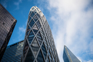 La Defense Paris France skyscraper architecture lattice geometric modern sky perspective low angle wide abstract clean dramatic blue tone