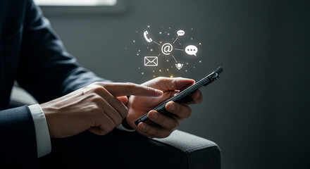Person using smartphone with digital communication icons floating above