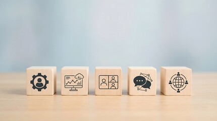 wooden blocks with business icons