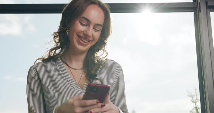 Smile, business and woman with phone in office for research, contact source and confirm schedule. Below, person and lens flare with mobile for editor feedback, fact check and publication notification