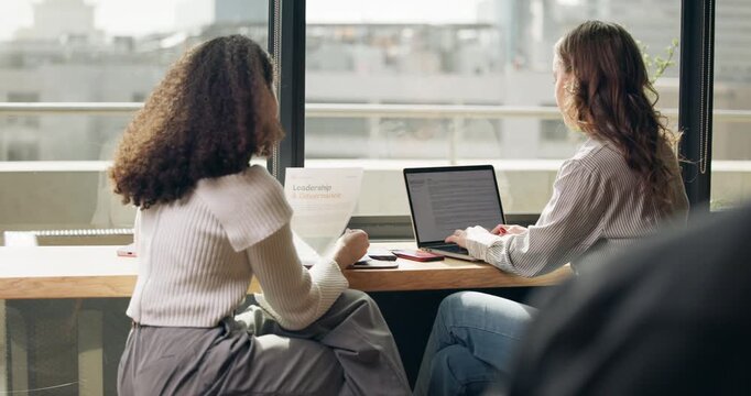 Conversation, laptop and discussion with business people in cafe for research, article feedback or planning. Journalist partnership, source fact check or online story with women in coffee shop lounge