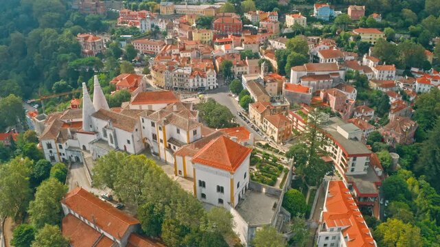 Scenic aerial panorama of Sintra Portugal historic architecture buildings city town green hills representing cultural heritage travel exploration beauty of European history resort European sightseeing