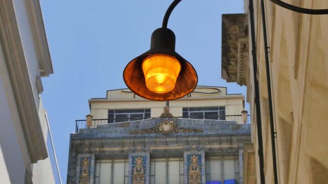 Orange street light in an alley