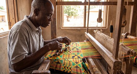 Artisan weaver crafting colorful fabric in a traditional workshop