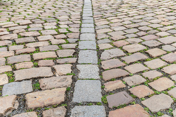 abstract background of stone tiled road perspective view shallow depth of field