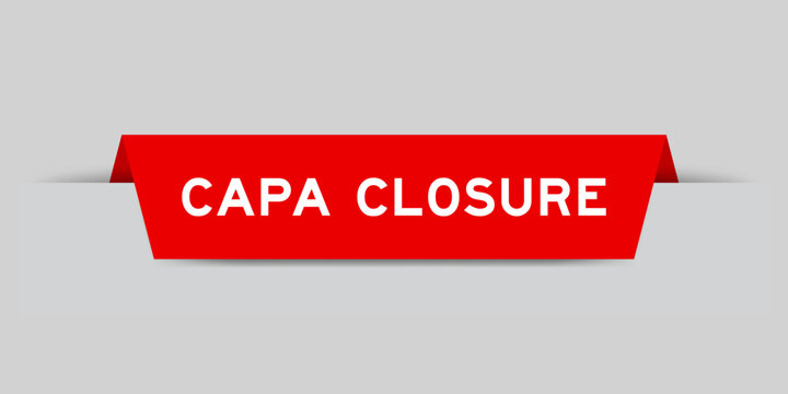 Red color inserted label with word CAPA closure on gray background