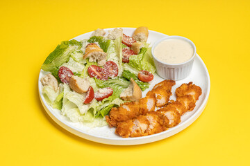 Fresh Caesar Salad with Crispy Chicken Strips