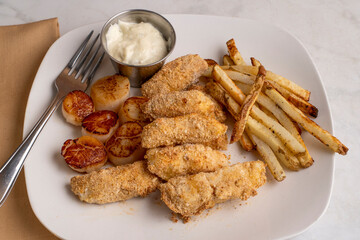 haddock bite with scallops and  fries