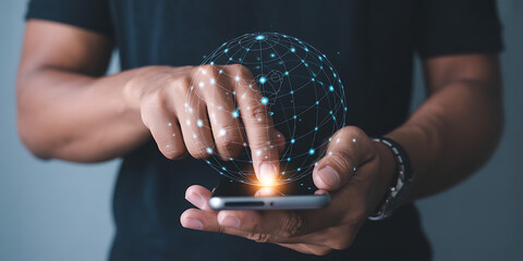 Man interacting with futuristic global network on smartphone