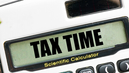 TAX TIME words on calculator display.