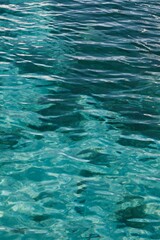 Vibrant sparkling water texture with starburst highlights, perfect for summer or luxury background.