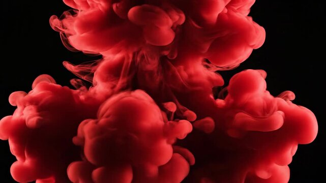 Abstract red cloud formation against black background