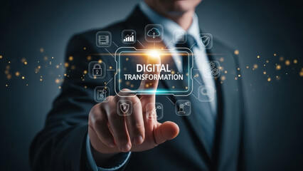 Businessman's finger touches 'Digital Transformation' holographic screen surrounded by technology icons including AI, Cloud Computing, and Big Data. Future corporate innovation strategy.