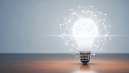Conceptual image of a bright, glowing LED light bulb surrounded by a futuristic digital neural network, symbolizing business innovation, creative idea generation, artificial intelligence, and technolo